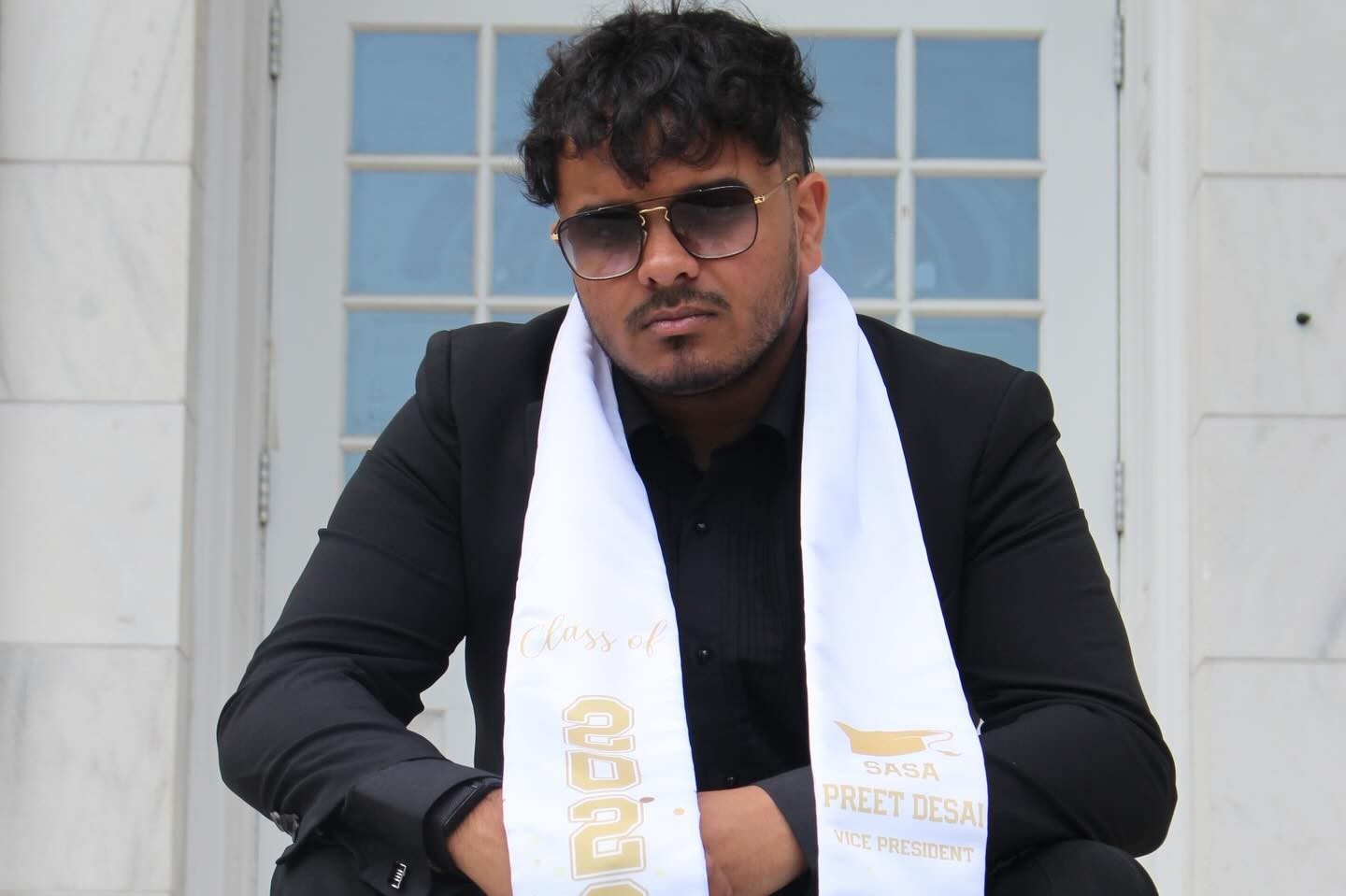 Preet Desai at Rowan graduation wearing a SASA vice president stole