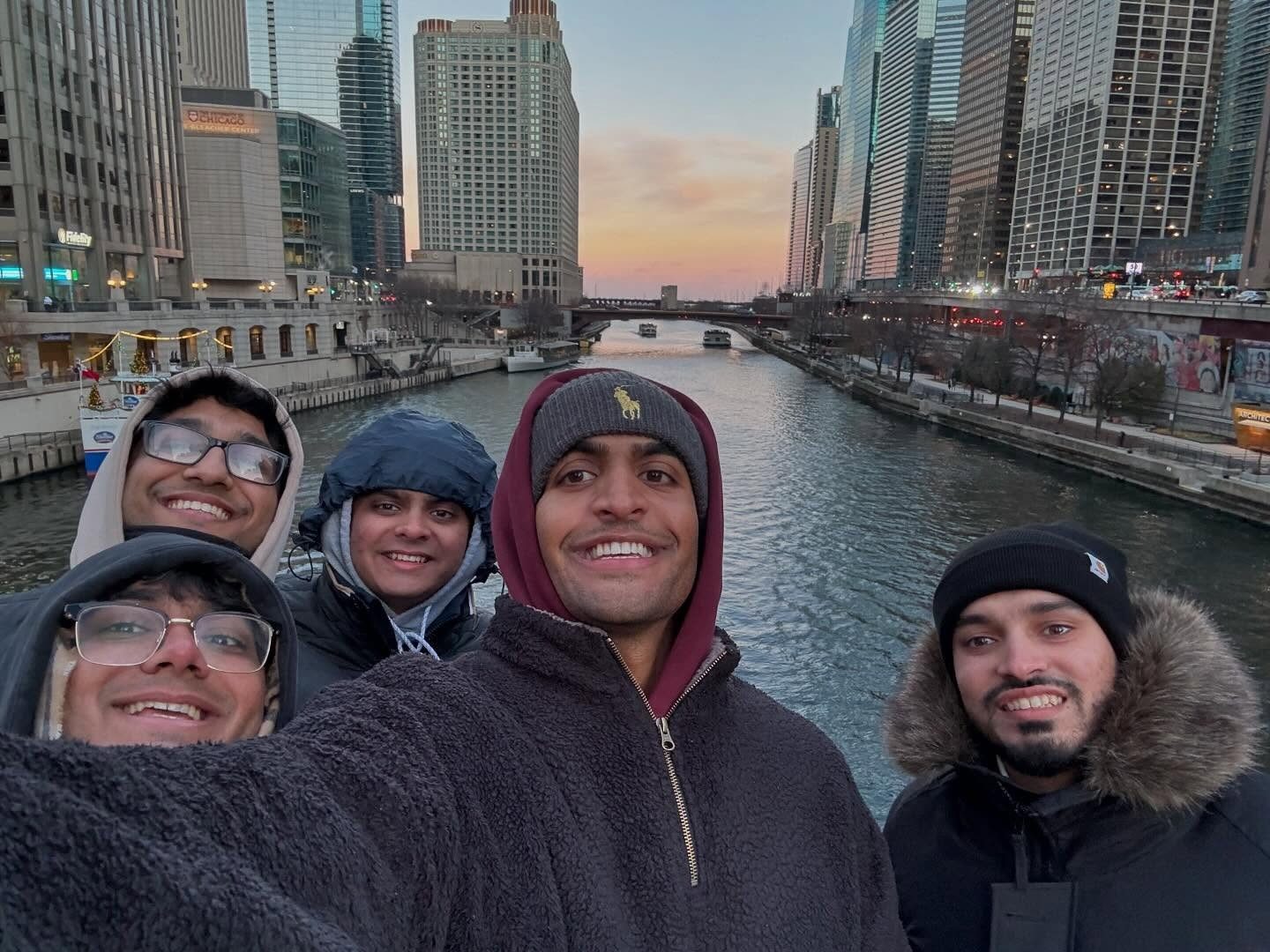 Friends taking a selfie along the Chicago River
