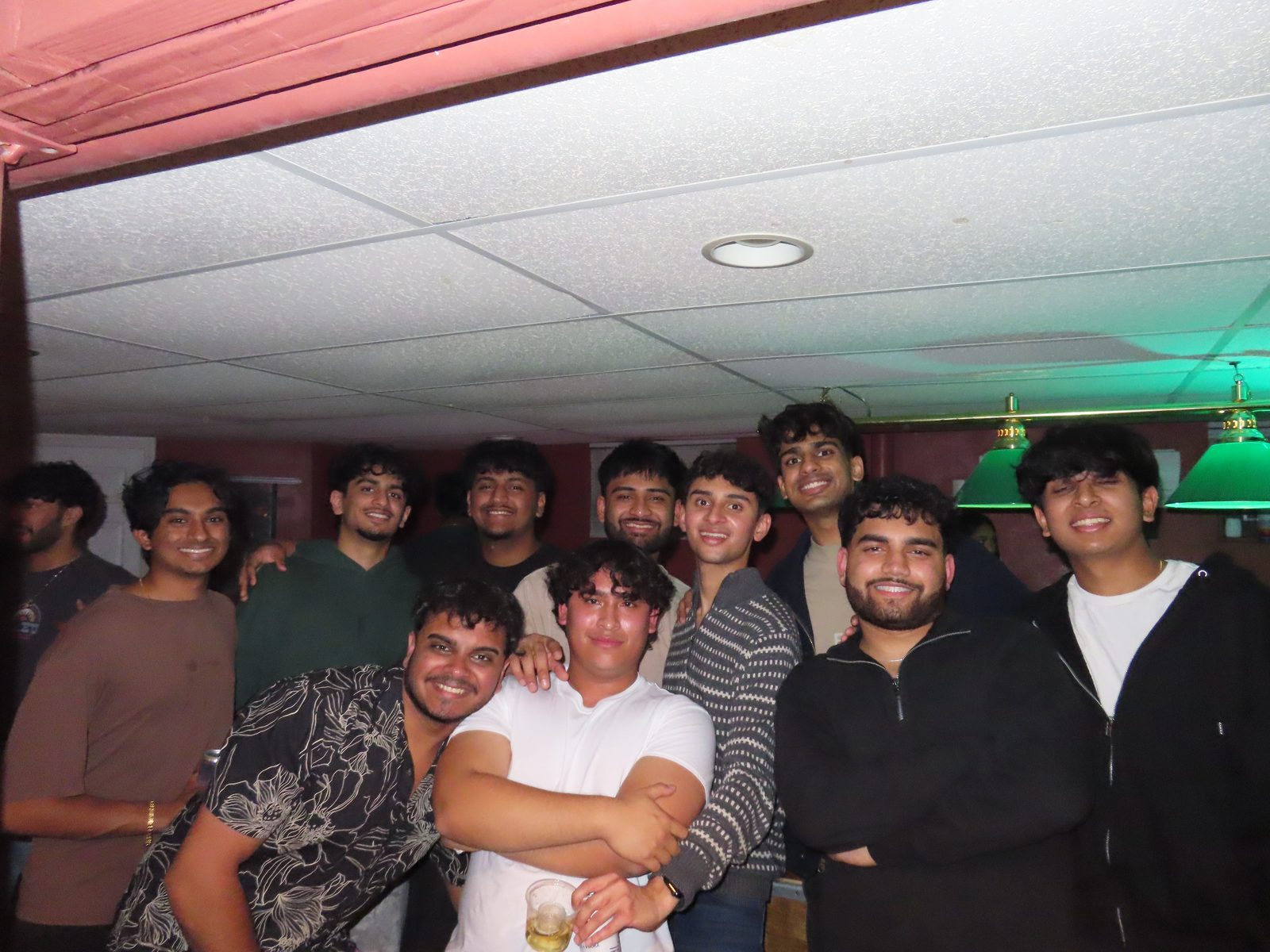 Friends together at an indoor gathering