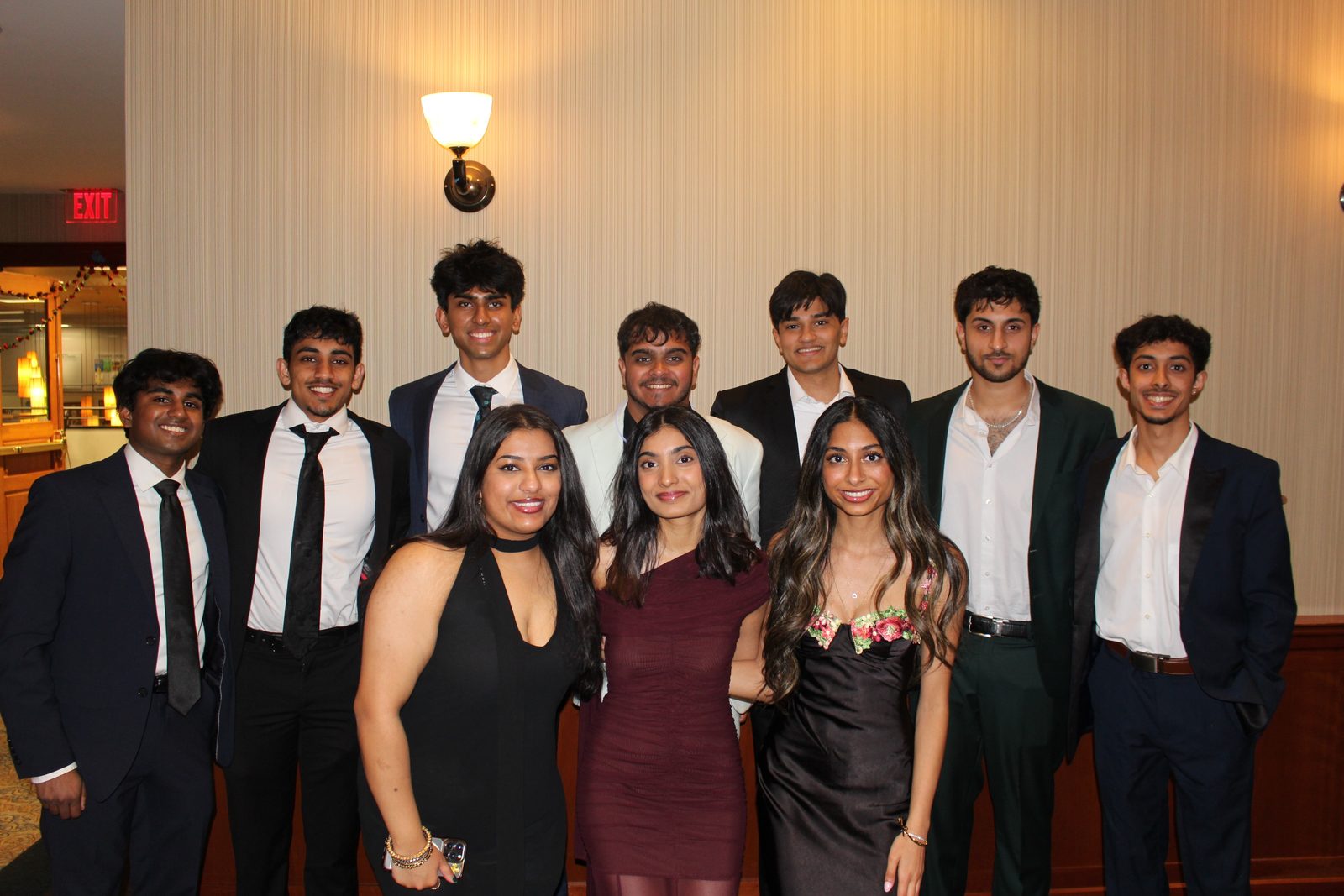 Preet Desai and friends in formal attire